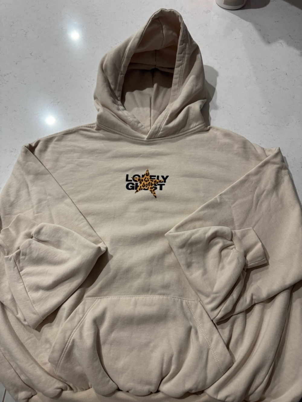 LONELY GHOST Cream Hoodie with Leopard Star Logo